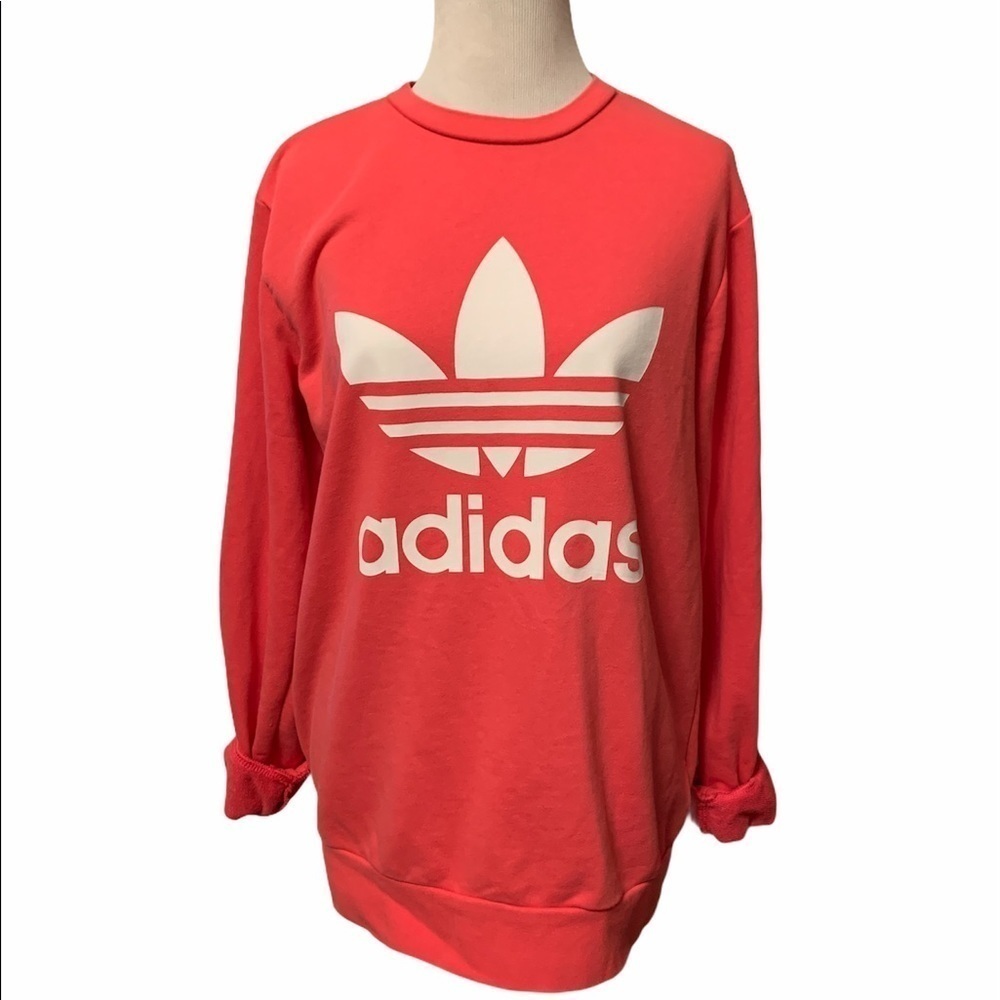 Bright melon colored Adidas large logo crew neck